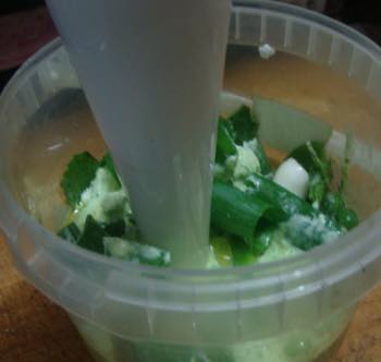 Blending the ingredients of the easy pesto recipe. Blending the ingredients of the easy pesto recipe.