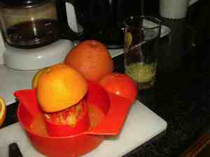 Squeezing orange juice. Squeezing orange juice.